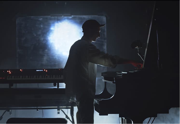 Josef performing with synthesizers